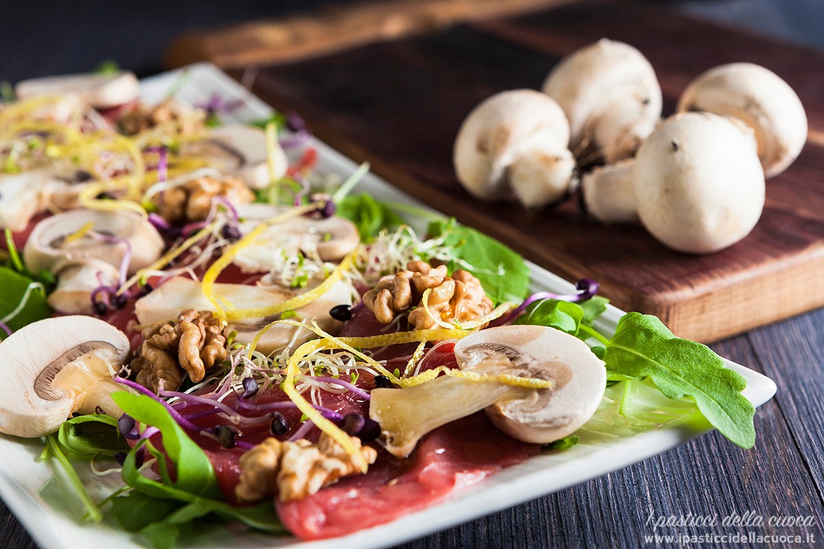 carpaccio di vitello con funghi e noci